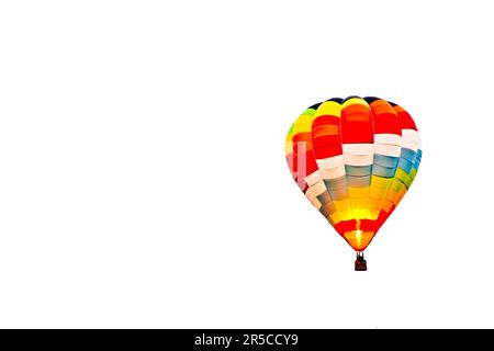 Fire balloon during a foggy day on white background Stock Photo
