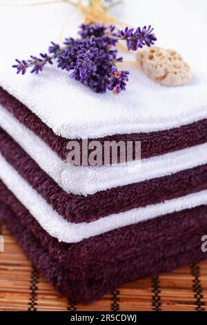 White Spa Towels Pile With Lavender On White Background Stock Photo,  Picture and Royalty Free Image. Image 23560797.