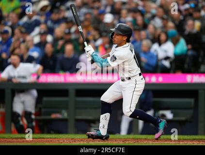 Seattle Mariners' Kolten Wong follows through during a baseball game  against the Washington Nationals, Tuesday, June 27, 2023, in Seattle. (AP  Photo/Lindsey Wasson Stock Photo - Alamy