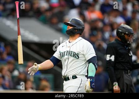 Seattle Mariners' Ty France removes his batting gear after