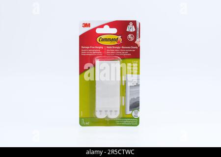 3M Command picture hanging strips isolated on white. Command Self-Adhesive Strips for Hanging large frames without damage. Stafford, United Kingdom, J Stock Photo