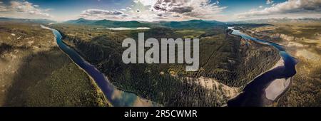 Aerial, drone view along the Yukon River in spring, early summer with panoramic, magnificent panorama views in wilderness area of Canada Territory. Stock Photo