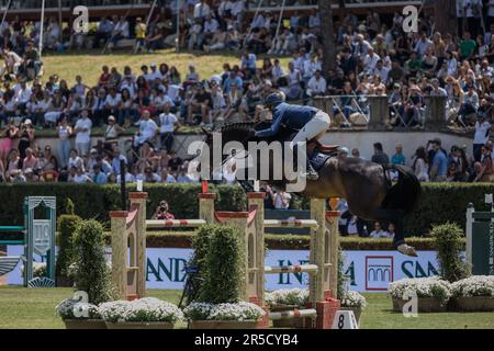 Rome, Italy - 28th May, 2023: ROME ROLEX GRAND PRIX 2023 INTERNATIONAL, Equestrian jumping, Piazza di Siena. First round, horse rider Martin Fuchs (SUI) in action on playground during competition. Stock Photo