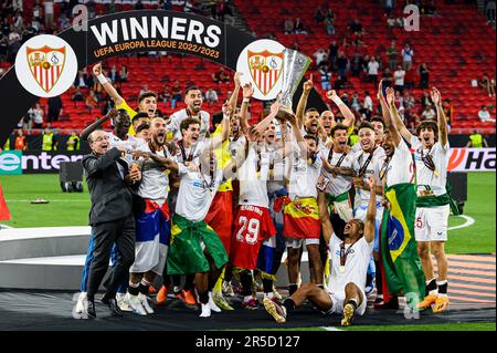 Budapest, Hungary. 1 June 2023. Players of Sevilla FC lift the trophy cup during the award ceremony following the UEFA Europa League final football match between Sevilla FC and AS Roma. Credit: Nicolò Campo/Alamy Live News Stock Photo