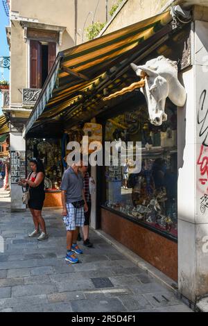 Exterior and shop windows of a Venetian masks shop in the sestiere of Cannaregio, Venice, Veneto, Italy Stock Photo