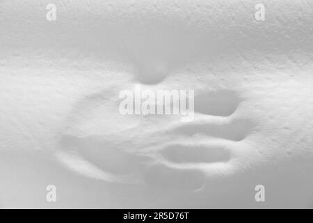Handprint on white memory foam pillow, closeup. Banner design with ...