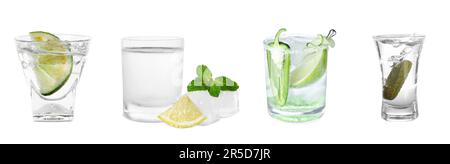 Set with tasty alcoholic drinks in shot glasses on white background Stock Photo