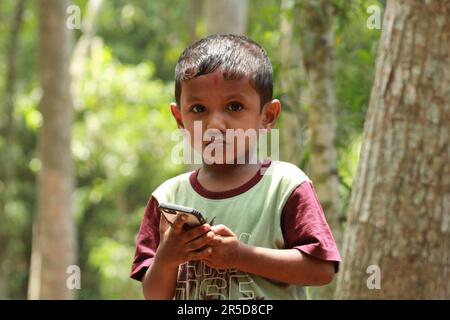 Indian little boy is standing Stock Photo