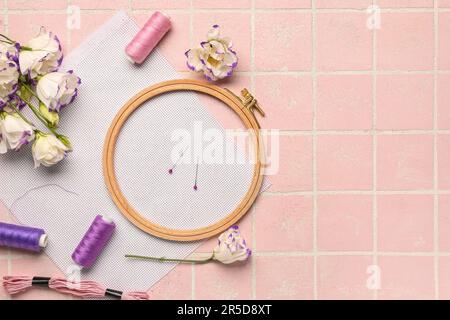 Set of different embroidery supplies on grey background Stock