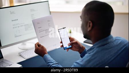Taking Invoice Document Photo Using Phone Or Smartphone Stock Photo