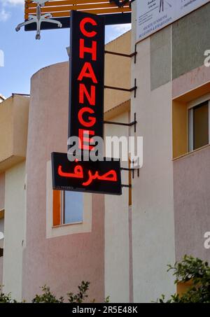 Sousse, Tunisia, January 22, 2023: Sign in Arabic and English for a currency exchange office in the center of Sousse Stock Photo
