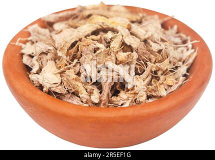Sliced and dried ginger in a bowl Stock Photo