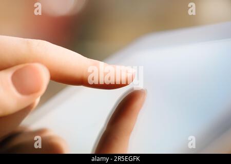 Hand, woman and touching tablet, screen and responsive technology for typing online with an app, network or social media. Hands, touchscreen and Stock Photo