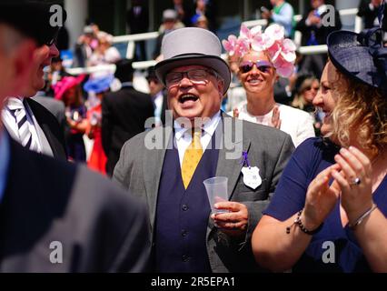 Racegoers enjoy the atmosphere during Derby Day of the 2023 Derby Festival at Epsom Downs Racecourse, Epsom. Picture date: Saturday June 3, 2023. Stock Photo