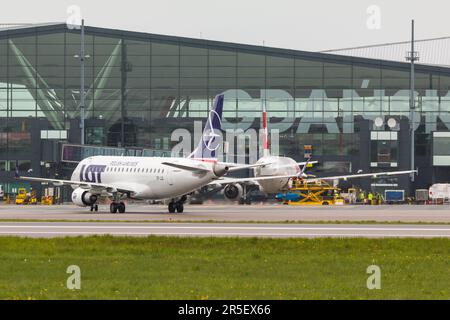 POLAND, GDANSK - 12 May, 2019: Aircraft line LOT taxiing on the airport runway. The Lech Walesa Airport in Gdansk. Stock Photo