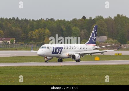 POLAND, GDANSK - 12 May, 2019: Aircraft line LOT taxiing on the airport runway. The Lech Walesa Airport in Gdansk. Stock Photo