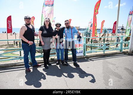 Brighton UK 3rd June 2023 - Skinheads enjoy the sunshine at the annual Great Skinhead Reunion weekend in Brighton where they gather from around the World to enjoy their music and fashion: Credit Simon Dack / Alamy Live News Stock Photo