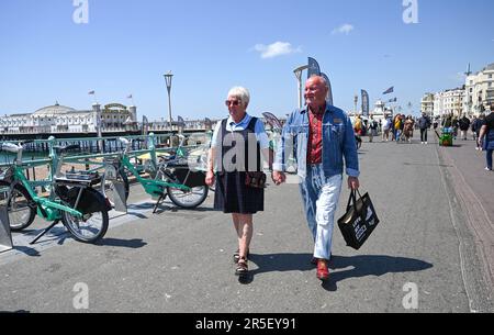 Brighton UK 3rd June 2023 - Skinheads enjoy the sunshine at the annual Great Skinhead Reunion weekend in Brighton where they gather from around the World to enjoy their music and fashion: Credit Simon Dack / Alamy Live News Stock Photo