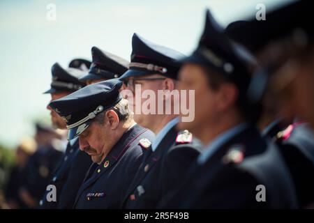 Eschede, Germany. 03rd June, 2023. Police officers attend the 25th anniversary at the memorial for the victims of the Eschede ICE accident. On June 03, 1998, after a wheel tire broke in Eschede, Lower Saxony, several carriages of an ICE train crashed into a road bridge at a speed of 200. 101 people die. Credit: Gregor Fischer/dpa/Alamy Live News Stock Photo
