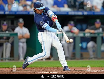 Kansas City, United States. 30th Mar, 2023. Kansas City Royals shortstop  Bobby Witt Jr. (7) hits a Minnesota Twins pitch during the first inning on  the Opening Day at Kauffman Stadium in