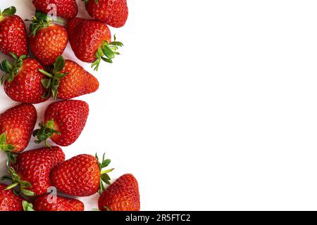 Fresh strawberries isolated on a white background shot from above. Stock Photo