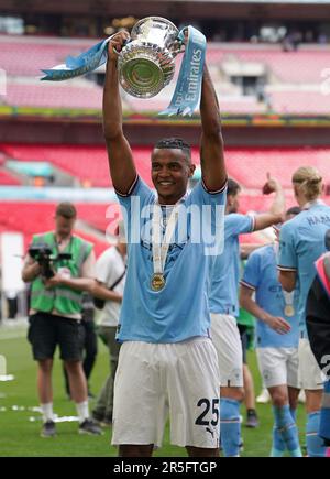 Manchester City's Manuel Akanji celebrates with the FA Cup following the Emirates FA Cup final at Wembley Stadium, London. Picture date: Saturday June 3, 2023. Stock Photo