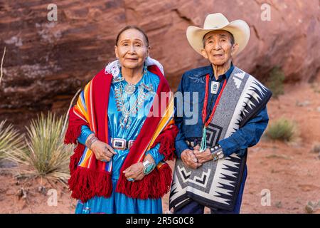 American Indian Navajo couple in Mystery Valley of Monument Valley Navajo Tribal Park, Arizona, United States Stock Photo