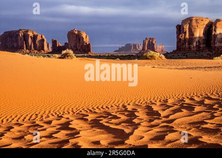 Sand Springs dunes at sunrise in Monument Valley Navajo Tribal Park, Arizona, United States Stock Photo
