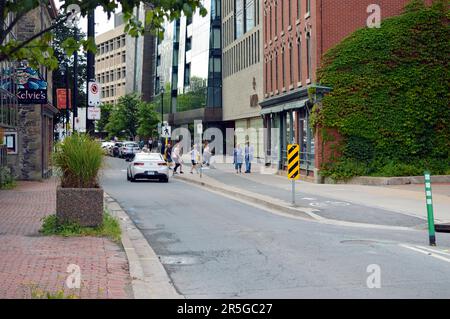 Lower Water Street in downtown Halifax, showing the segregated bike lane next to the Maritime Museum of the Atlantic Stock Photo