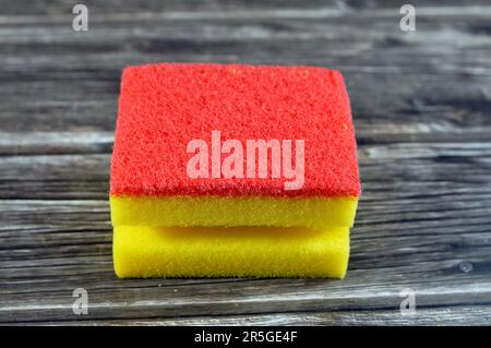 Combo Cellulose and abrasive two sided sponge for cleaning utensils, dishes, cookware, bathroom surfaces, everyday spills, counter tops, general clean Stock Photo