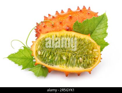 Ripe sliced kiwano fruits isolated on white background Stock Photo