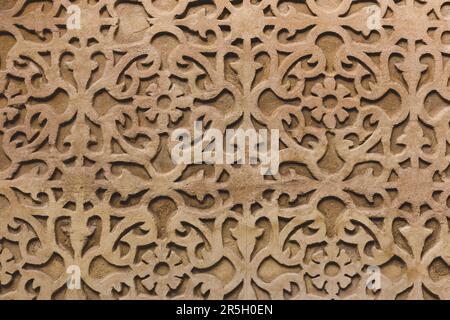 Floral shape ornamental stone building facade in Segovia, Spain, Mediterranean architecture, leaves and flower pattern. Stock Photo