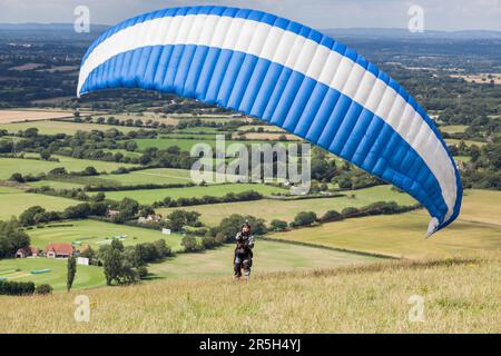DEVILS DYKE, BRIGHTON/SUSSEX - JULY 22 : Paragliding at Devil's Dyke near Brighton on July 22, 2011. Unidentified person Stock Photo