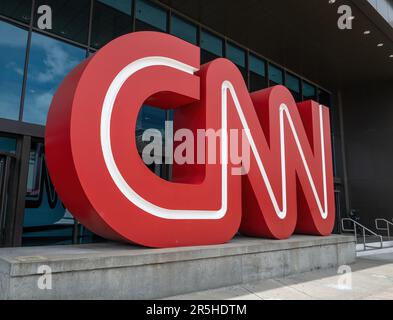 ATLANTA, GA – June 1, 2023: A sign in the form of the Cable News Network (CNN) logo is seen outside CNN Center in downtown Atlanta. Stock Photo