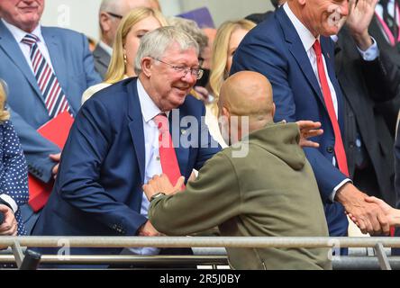 London, UK. 03rd June, 2023. 03 Jun 2023 - Manchester City v Manchester United - Emirates FA Cup Final - Wembley Stadium. Manchester City Manager Pep Guardiola shakes hands with former Manchester United Manager Sir Alex Ferguson after the 2023 FA Cup Final.                                                                                     Picture Credit: Mark Pain / Alamy Live News Stock Photo