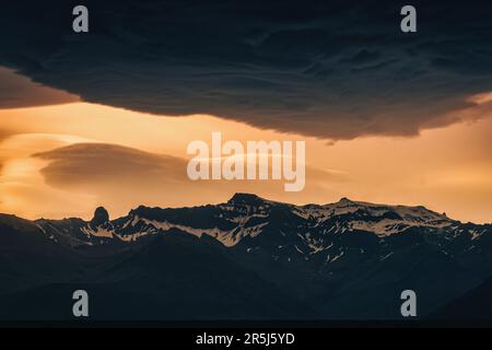 Dramatic landscape of colorful sunset sky and Asperitas cloud over Icelandic mountain in summer at Landmannalaugar, Iceland Stock Photo