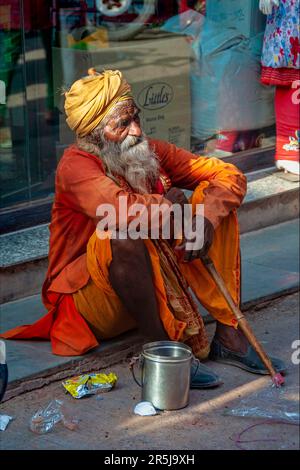 Old man begging for alms on the streets of Bikaner. Stock Photo