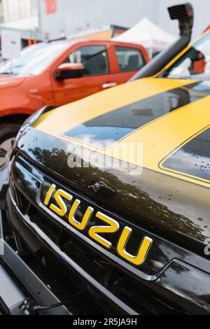 Novi Sad, Serbia - May 24, 2023: Closeup of Isuzu logo on modern new truck vehicle Stock Photo