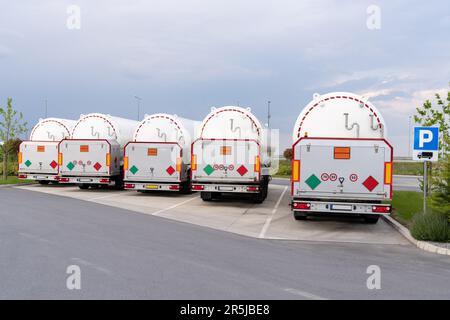 Tank trailers stand in a row. LPG transportation Stock Photo