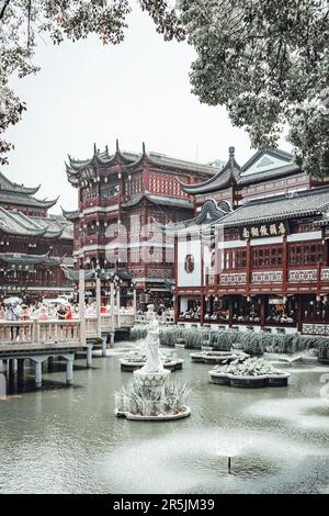 Yu Garden Pond with surrounding buildings in shanghai Stock Photo
