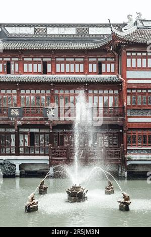 Yu Garden Pond with surrounding buildings in shanghai Stock Photo
