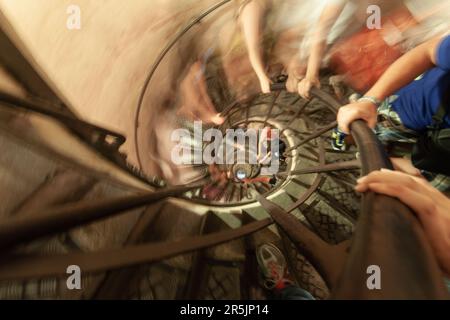 a spiral staircase inside the Arc de Triumph showing movement Stock Photo