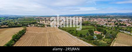 French ancient town Carcassonne panoramic view. Old castle with high stone walls. Famous tourist destionation in France, South Europe. Stock Photo