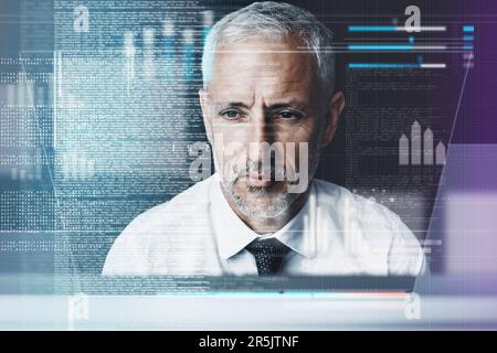Focused on coding. a mature businessman working on programming code. Stock Photo