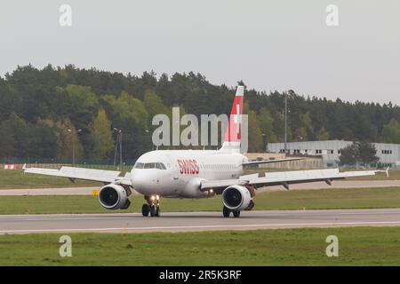 POLAND, GDANSK - 12 May, 2019: Aircraft line Swiss landing at the airport runway. The Lech Walesa Airport in Gdansk. Stock Photo