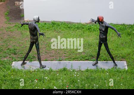 July 2021, Erfurt Germany, Two men, a new sculpture in Erfurt Stock Photo