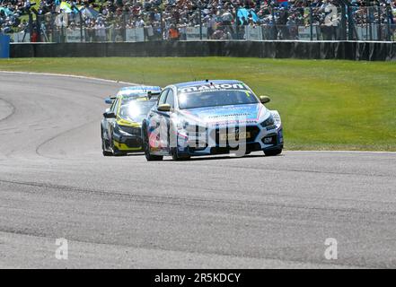 Andover, UK. 04th June, 2023. Thruxton Circuit, Andover, Hampshire, UK on June 04 2023. Tom Ingram, Bristol Street Motors with EXCELR8 TradePriceCars.com, Hyundai i30N in second leads over Josh Cook, One Motorsport with Starline Racing, Honda Civic Type R during round 11 of the Kwik Fit British Touring Car Championships (BTCC) at Thruxton Circuit, Andover, Hampshire, UK on June 04 2023. Credit: Francis Knight/Alamy Live News Stock Photo