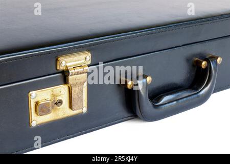 Close-up of a closed black executive-style briefcase isolated on a white background Stock Photo