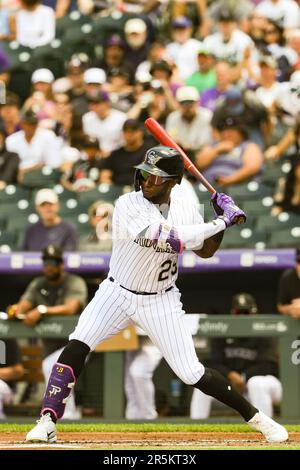 Colorado Rockies left fielder Jurickson Profar (29) wears a pair of Nike  cleats featuring the face of the team's mascot, Dinger the dinosaur, in the  ninth inning of a baseball game Tuesday