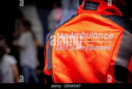 Joint emergency services display with focus on water safety. RNLI and Coastguard crews and vessels demonstrate the recovery of a victim from the sea. Stock Photo